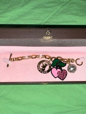 Juicy Couture Gold Charm Bracelet with Pink and Green Cherry Charms